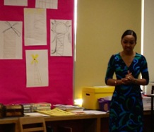Author presenting to student