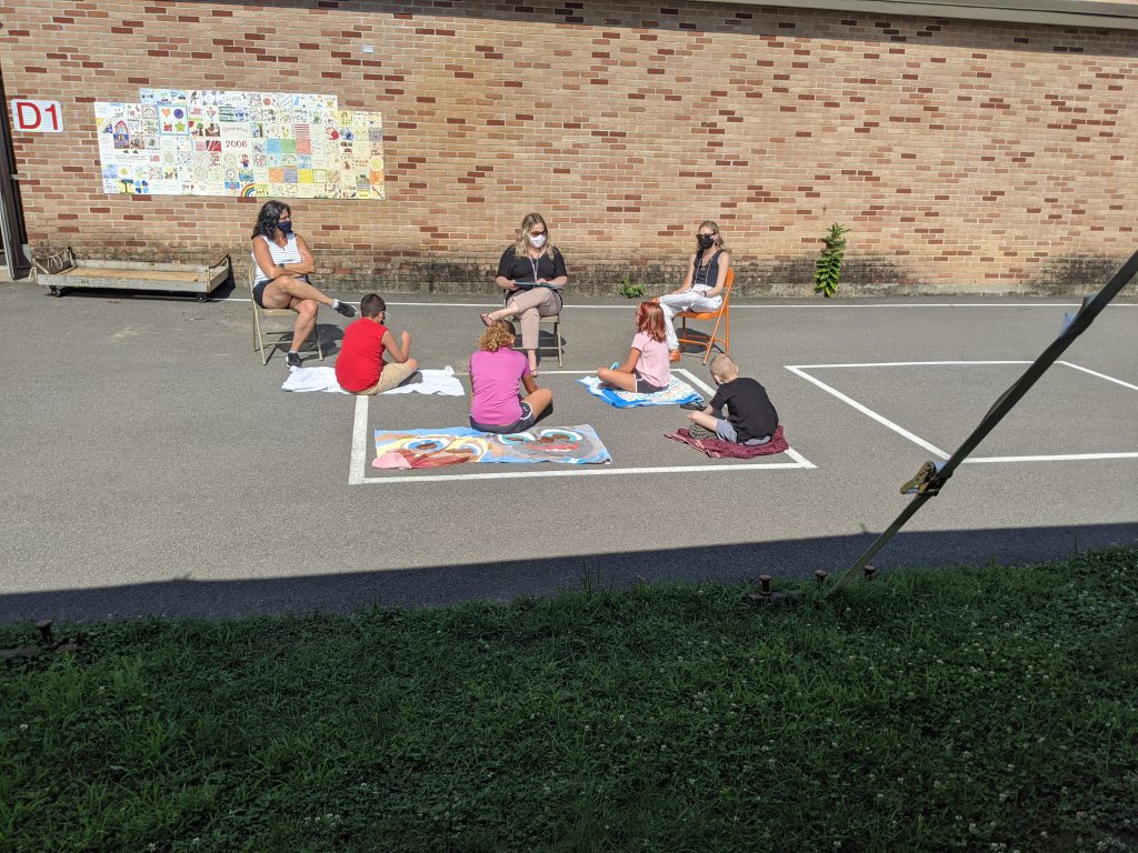 students learning outside safely