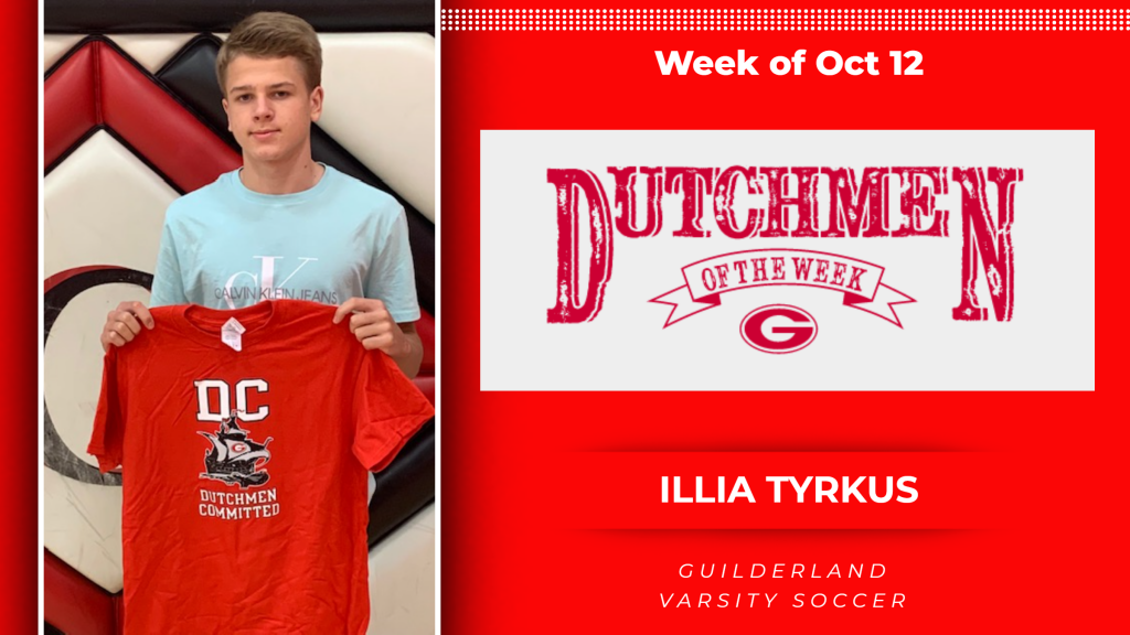 Picture of Illia Tyrkus holding Dutchmen t-shirt for th award