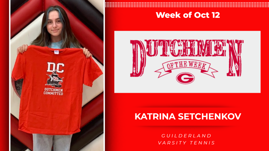 Picture of Katrina-Setchenkov holding Dutchmen t-shirt for the award