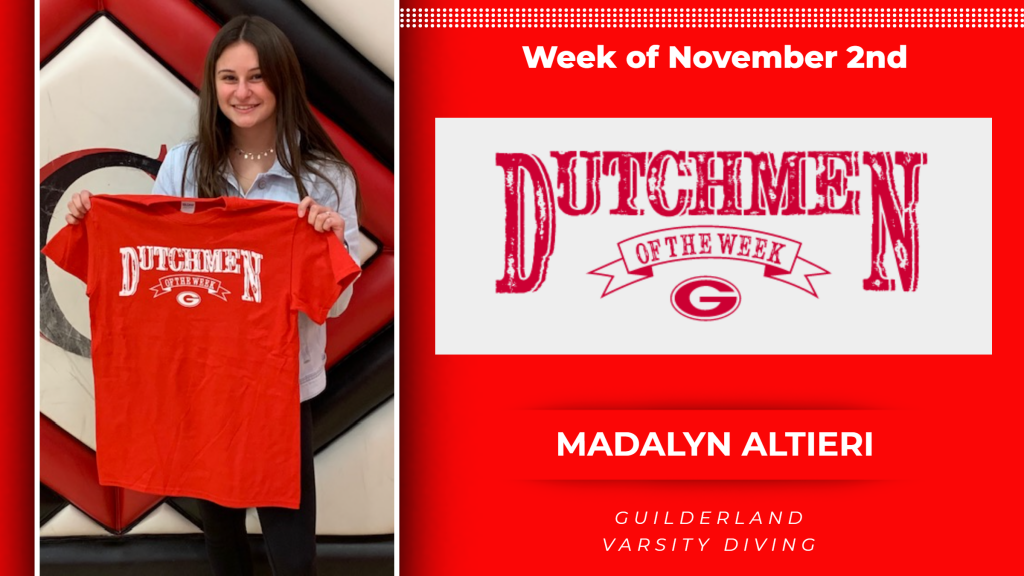 Madalyn Altieri holding tshirt for award