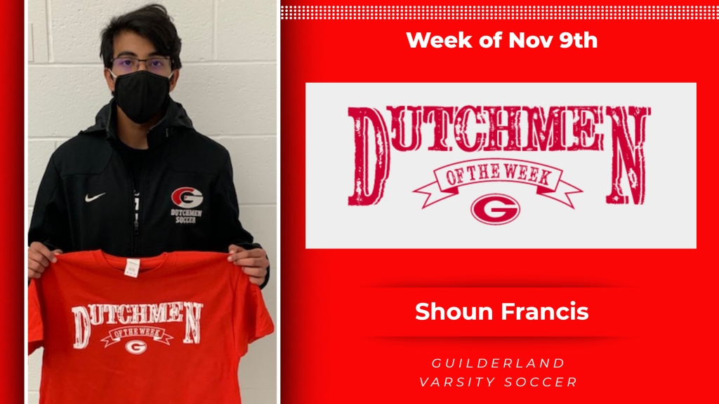Picture of Nov. 9 Dutchmen of the week, Shoun Francis (Varsity Soccer) holding "Dutchmen Committed" t-shirt award