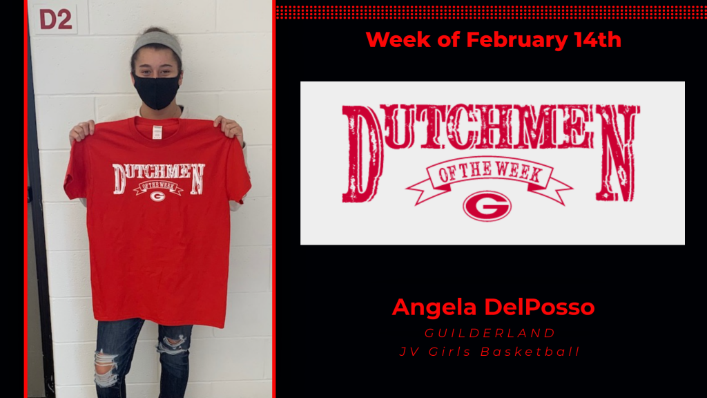 Angela DelPosso holding the Dutchmen of the Week award t-shirt