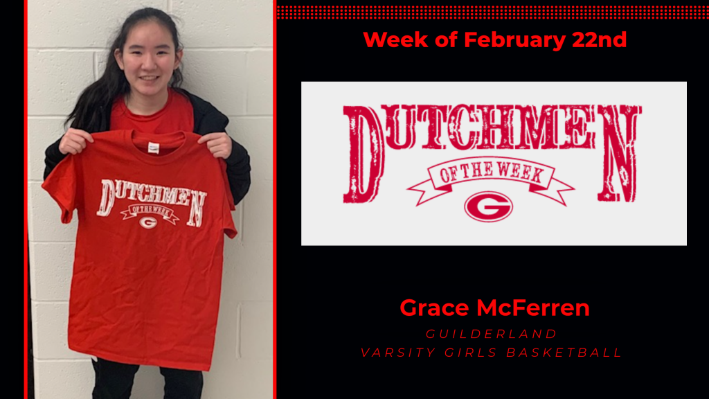 Grace McFerren holding the Dutchment of the Week Award t-shirt