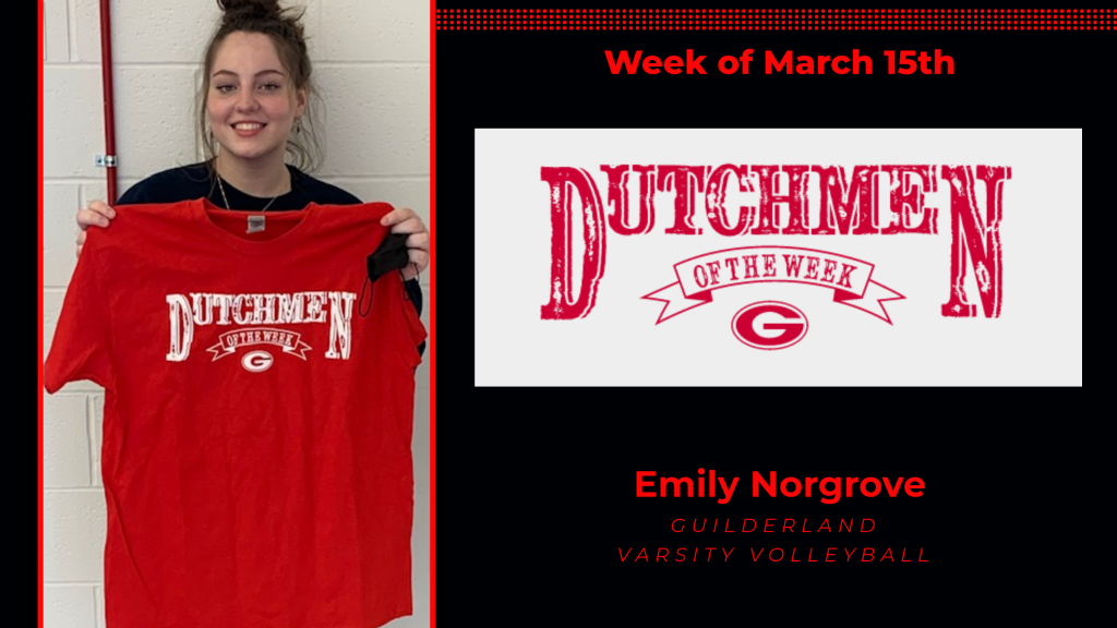 Emily holding the Dutchment of the Week Award red t-shirt