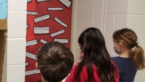 Picture of students observing Black History Month display built by a class at Lynnwood Elementary