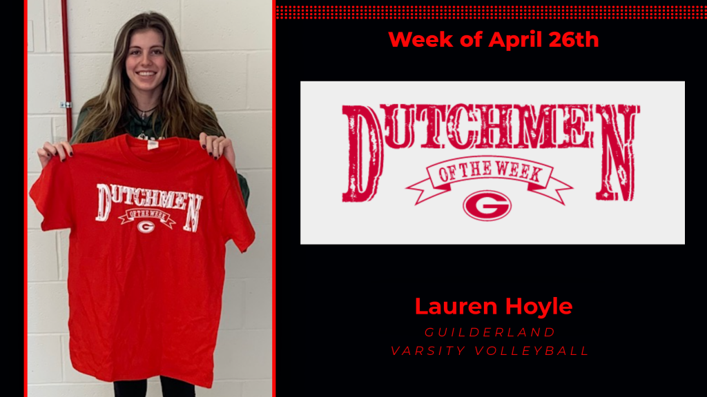 Student athlete Lauren Hoyle smiles for the camera holding a red Dutchmen shirt with white lettering.