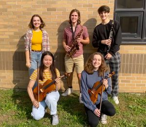 Picture of five students selected for all-state ensembles posing with their instruments 
