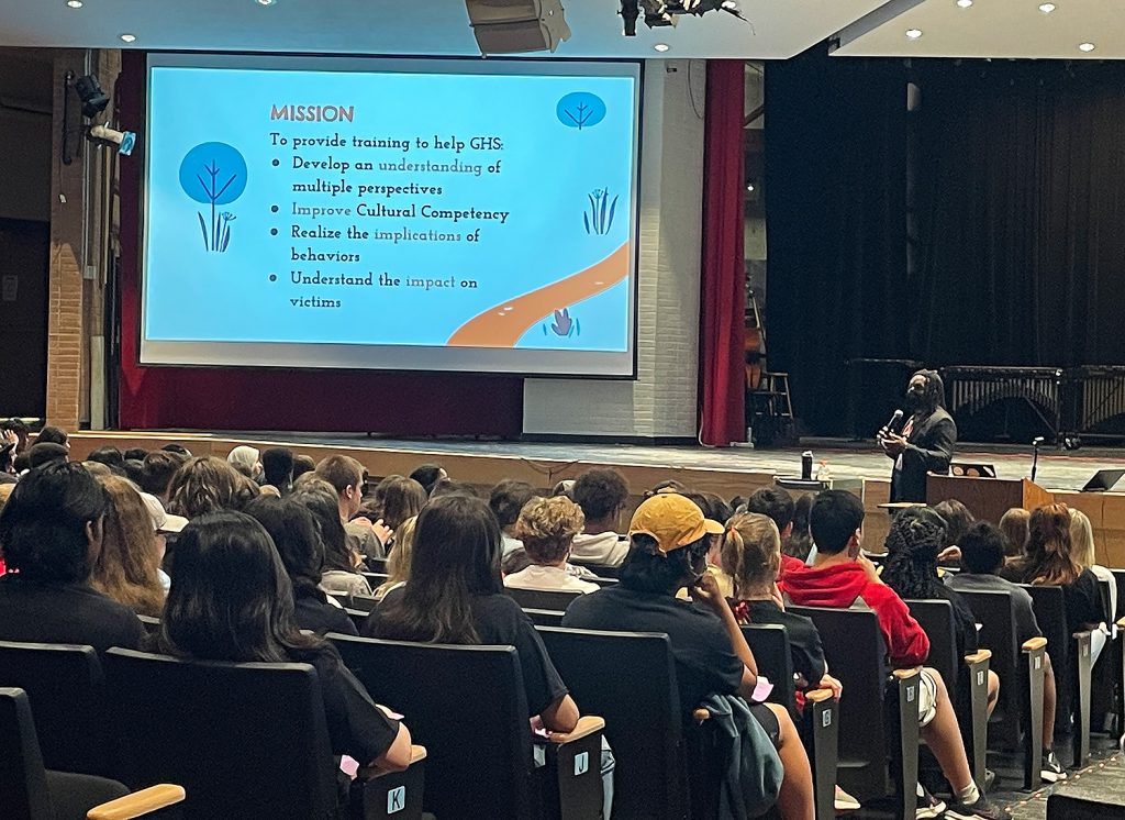 DEI Director Matt Pinchinant giving his presentation to the visiting 8th grade students from FMS.