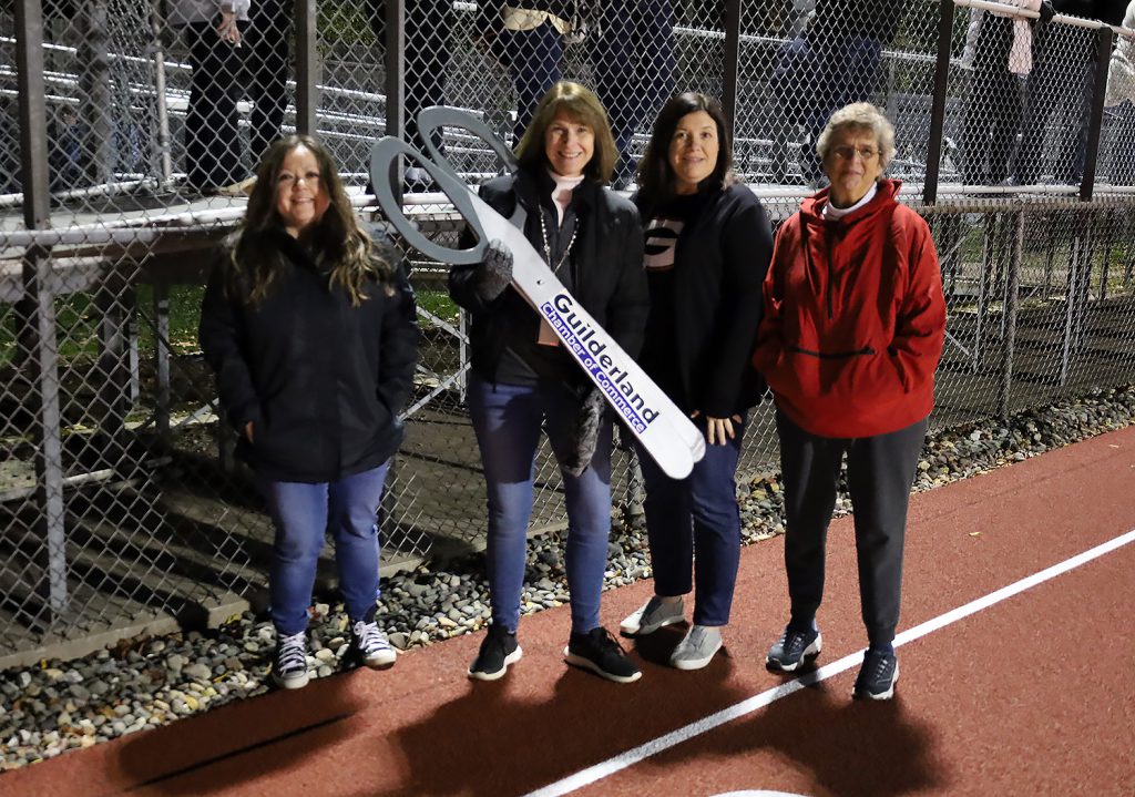 Superintendent Wiles and 3 board of education members.