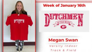 Megan posing for photo, holding Dutchmen of the Week t-shirt