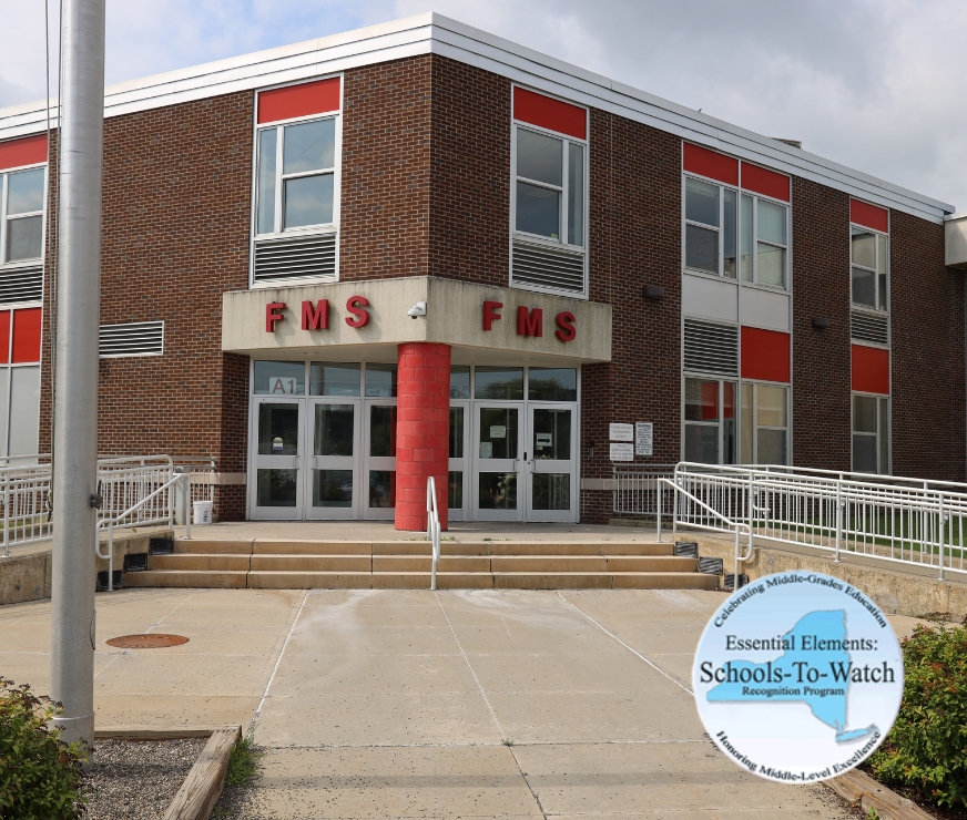 Front facade of Farnsworth Middle School, overlay of a seal that says Essential Elements: Schools-To-Watch Recognition Program, celebrating middle-grades education, honoring middle-level excellence