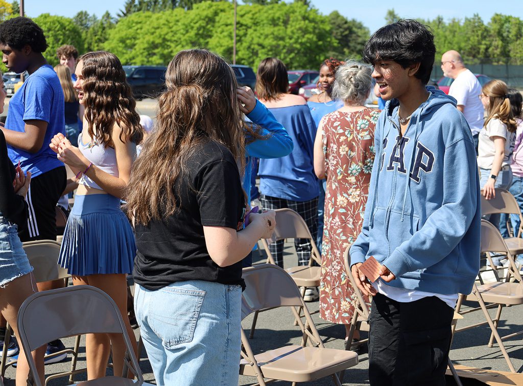 Two students engaging in conversation.