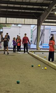 Students on a bocce court