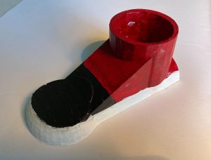 Close up image of 3D printed red shoe designed by student