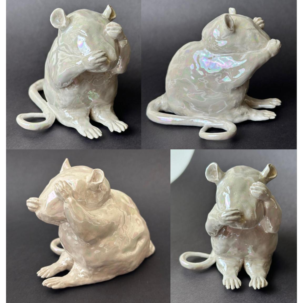 Four shots of a sculpture of a mouse with a paw in front of one eye