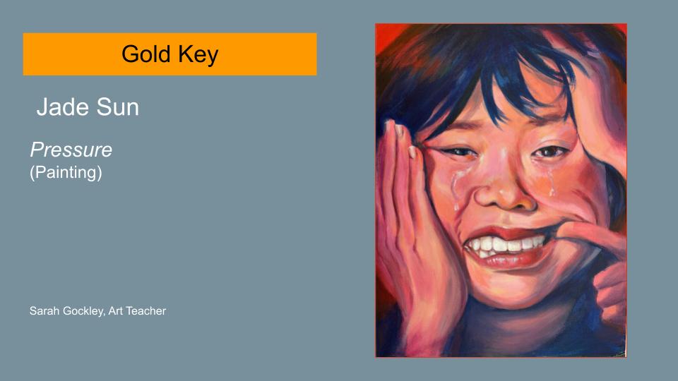 Text reads: Gold Key, Jade Sun, Pressure (Painting) Sarah Gockley, Art Teacher. Image is of a piece of artwork. It's of a young woman's face; she has a look of concern. She is holding her face in her hands.