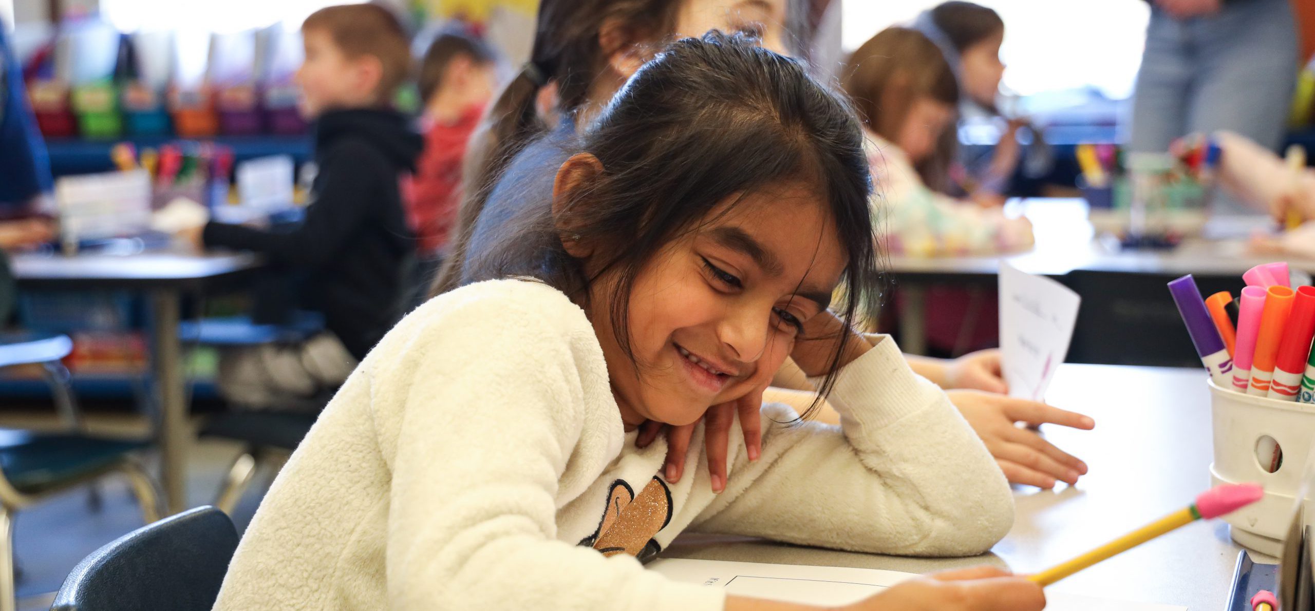 Elementary student doing classwork.