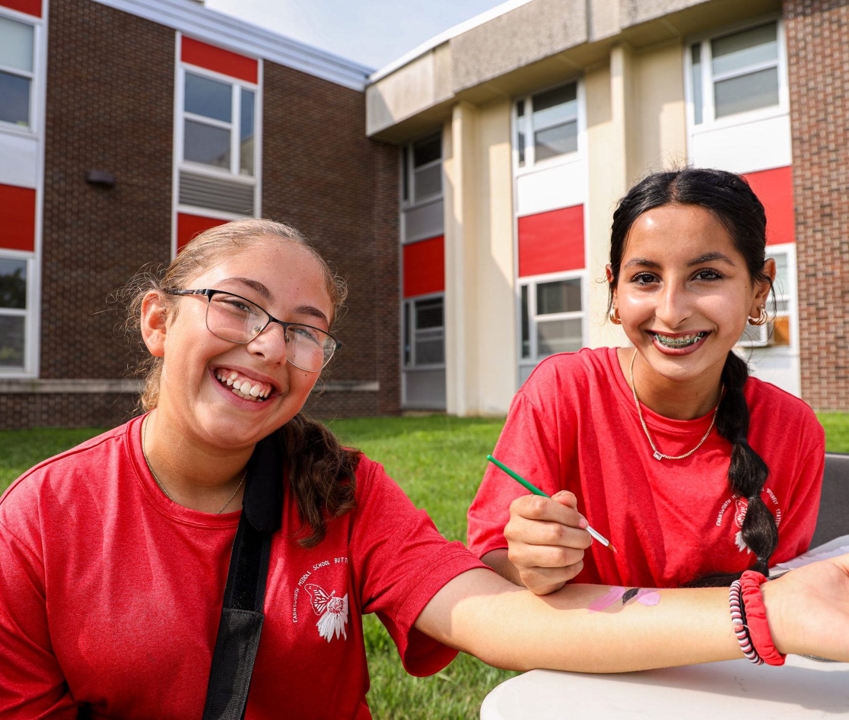 Students at FMS Butterfly Release painting butterflies.