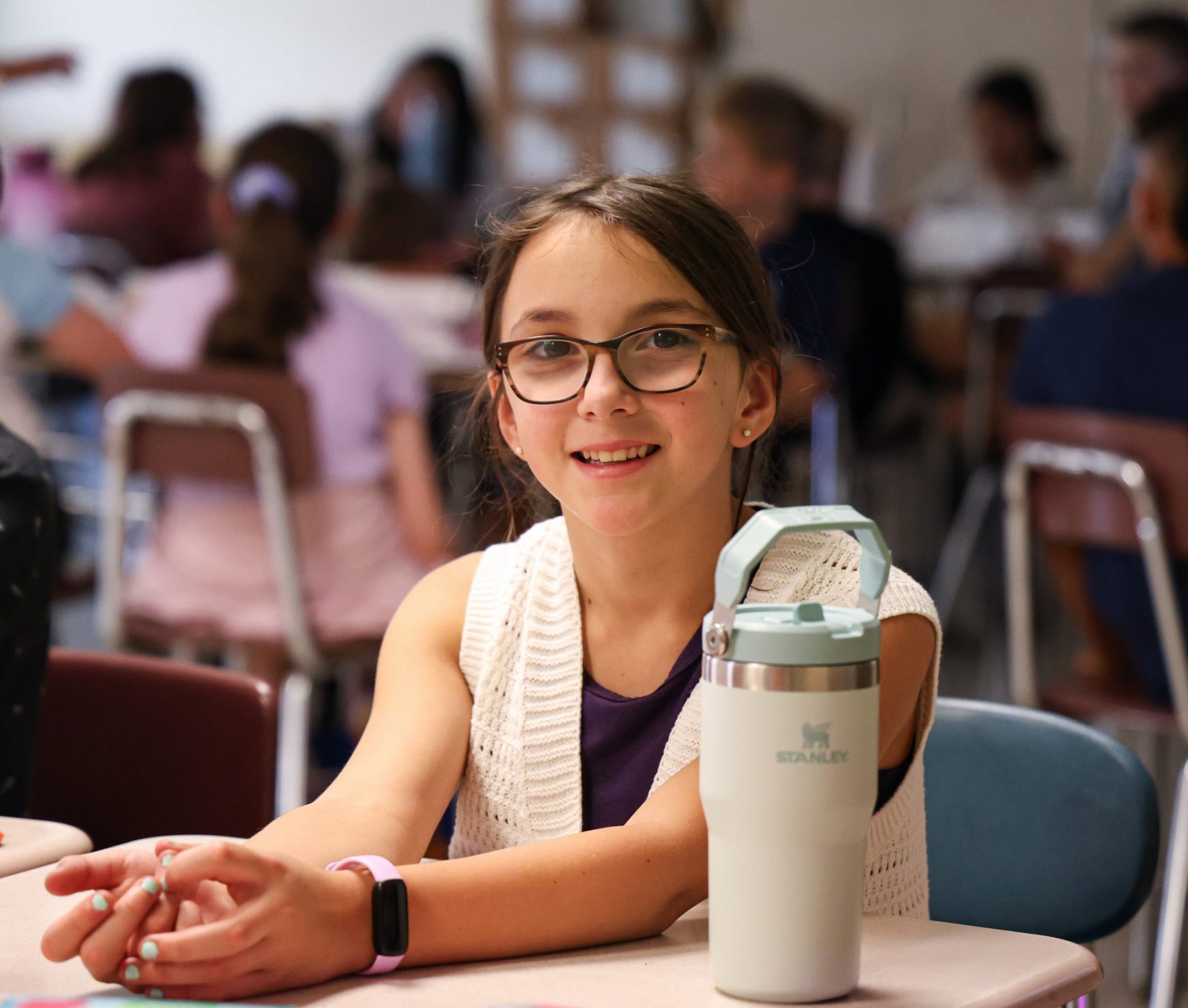 FMS student smiling in class.