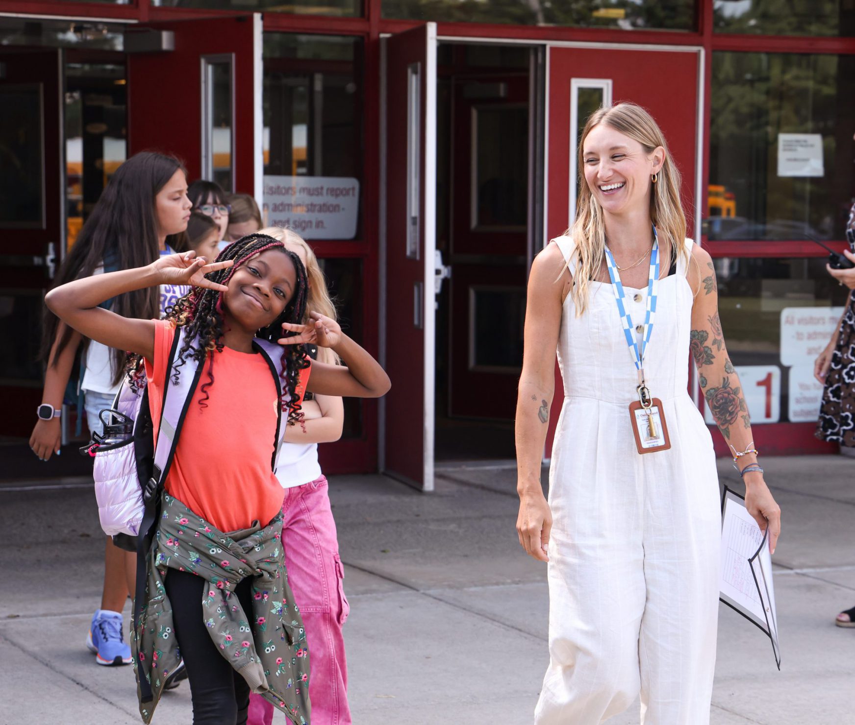 WES student and teacher smiling on the first day of school.
