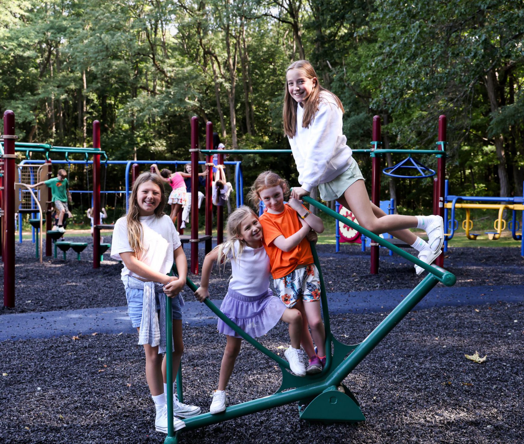GES students smiling on the playground.
