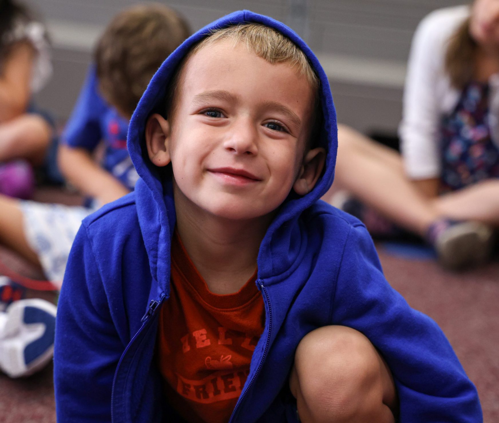 Student smiling in class.