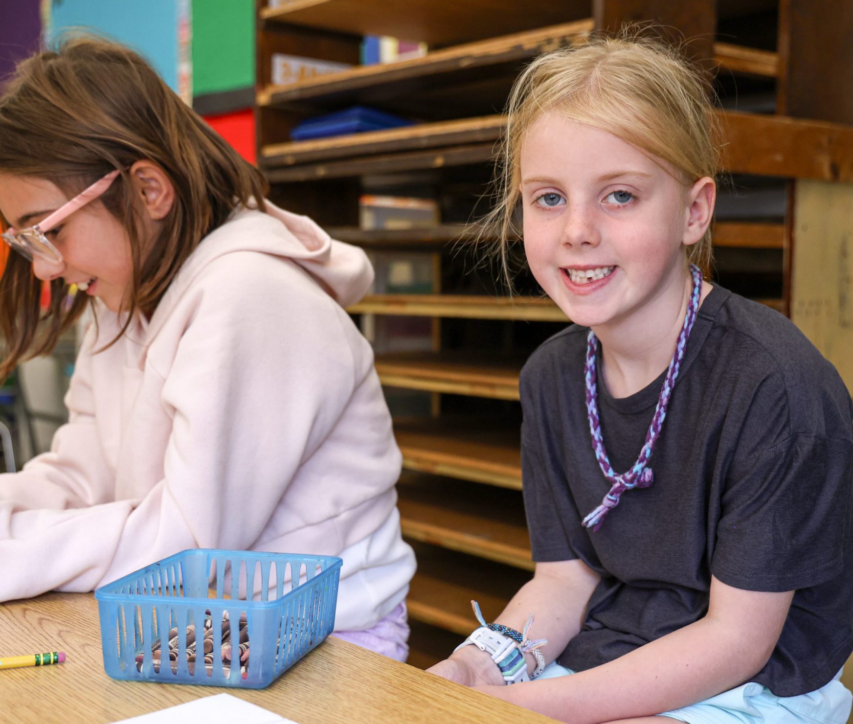 LES student smiling in art class.