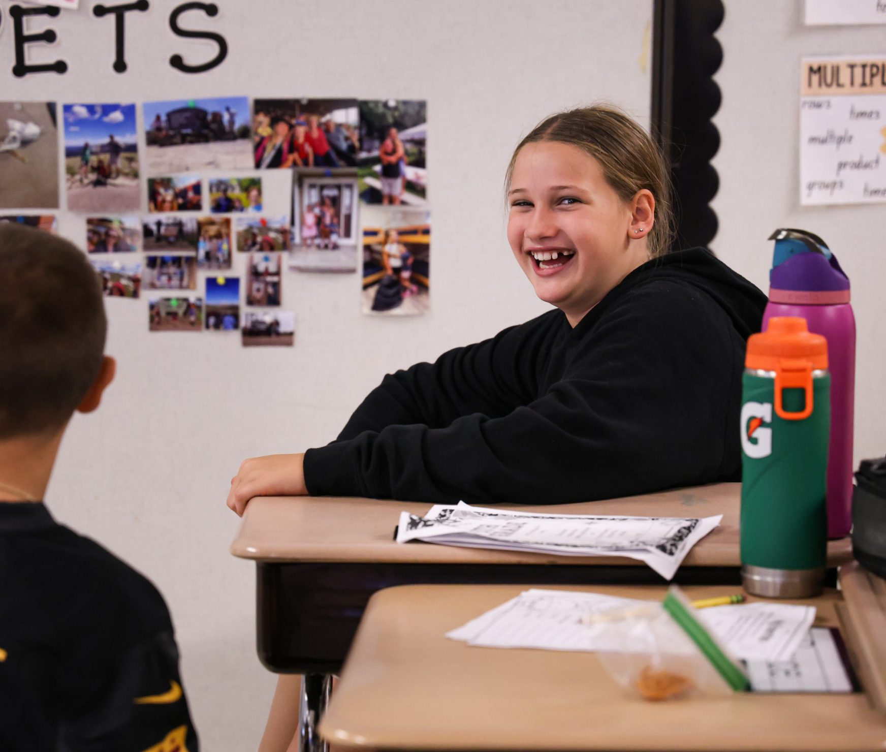 PBES student smiling in class.