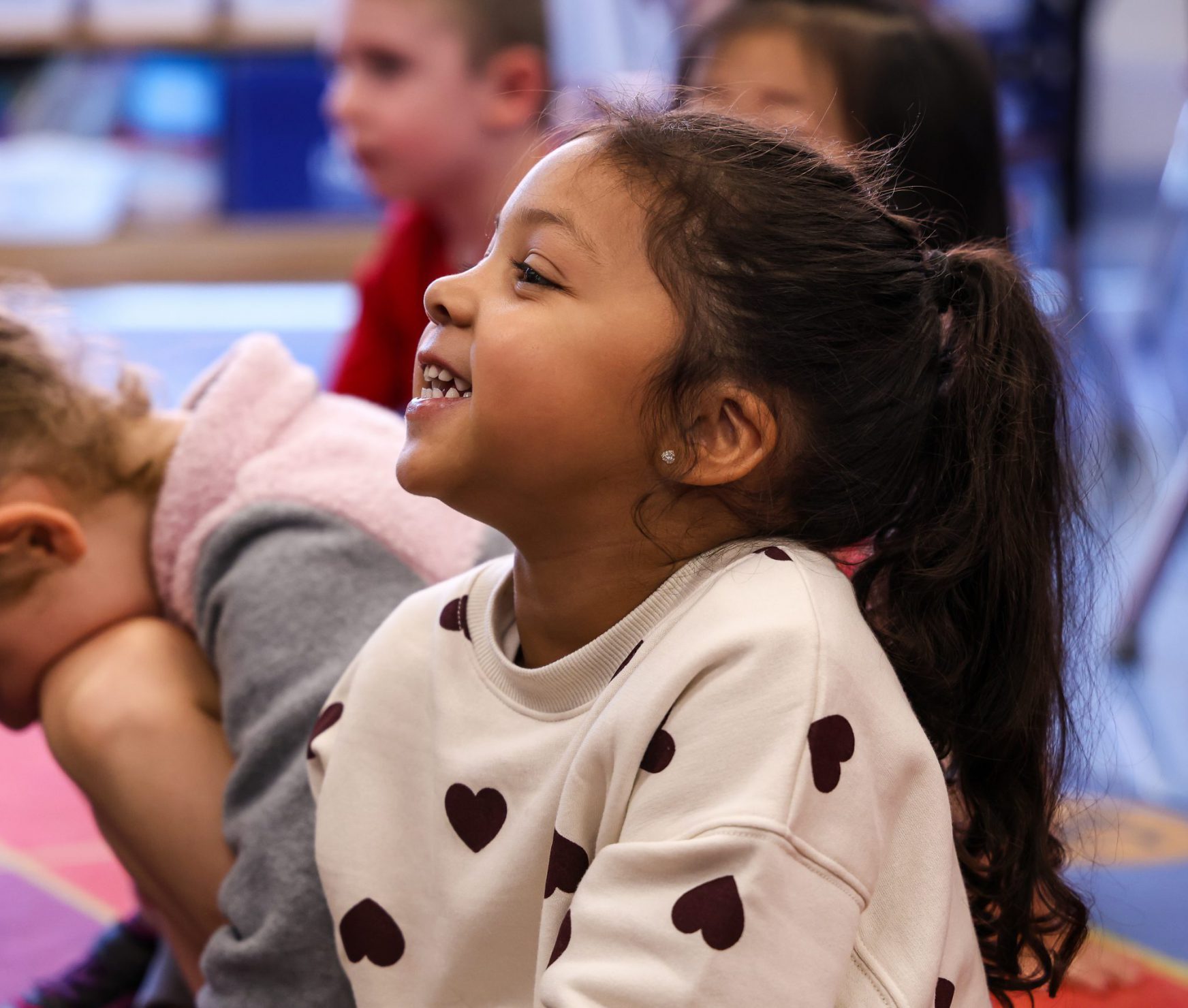 PBES student smiling in class.