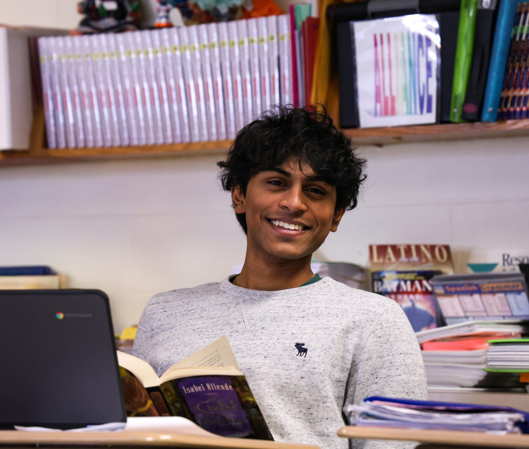 Student smiling in Spanish class.