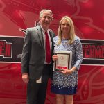 Photo of Principal Michael Laster and Retiree Nancy Cerutti